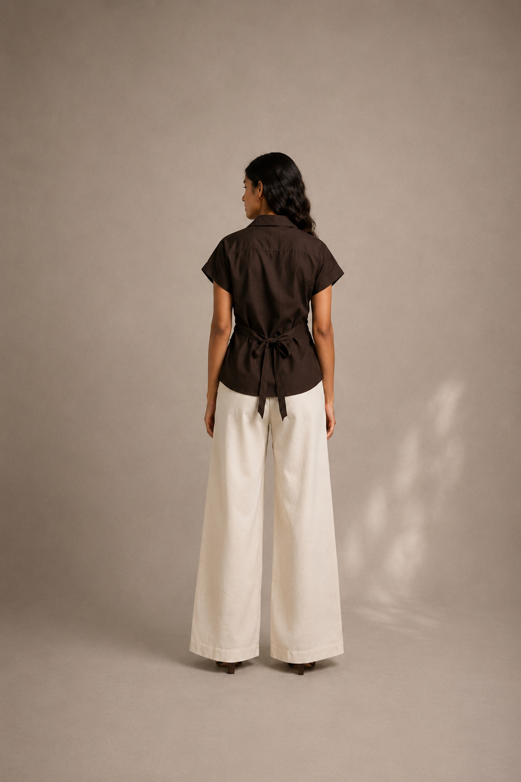 Model wearing The Mocha Heart Women's Shirt styled for a smart casual daytime outfit.[Back]