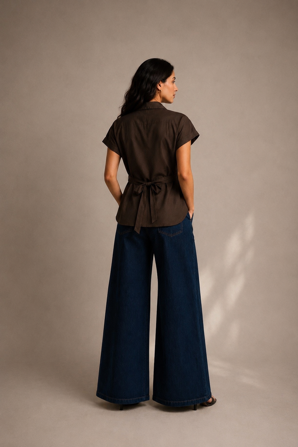Model wearing The Mocha Heart Women's Shirt styled for a smart casual daytime outfit.[Back]