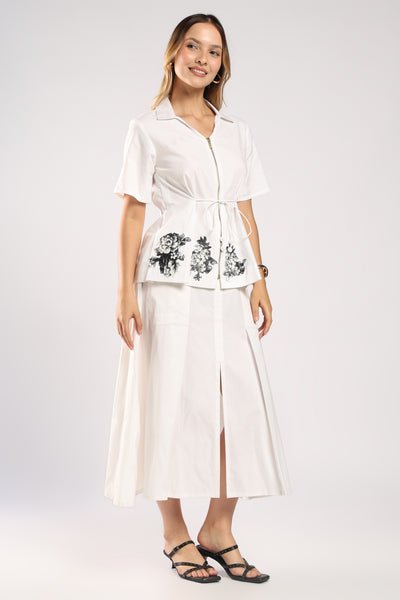 Front view of The Flora White Women's Skirt Set showing its structured and comfortable silhouette.