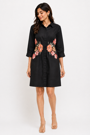 Front view of The Bloom Black Shirt Dress showing its comfortable A-line silhouette.