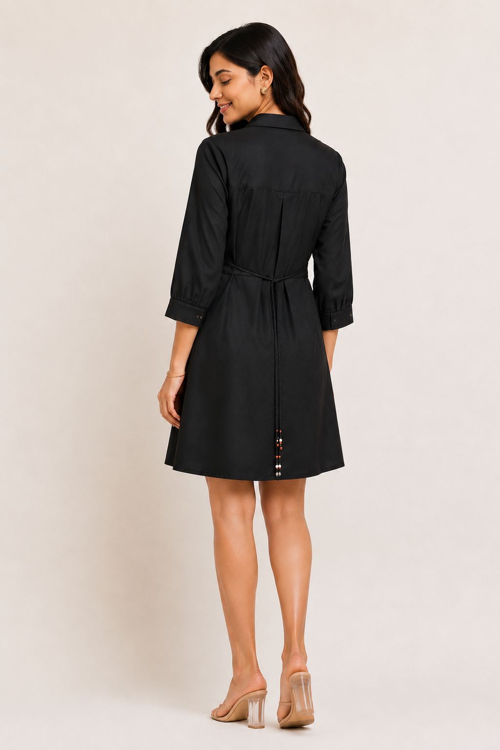 Back view of The Bloom Black Shirt Dress showing the adjustable waist tie-up.