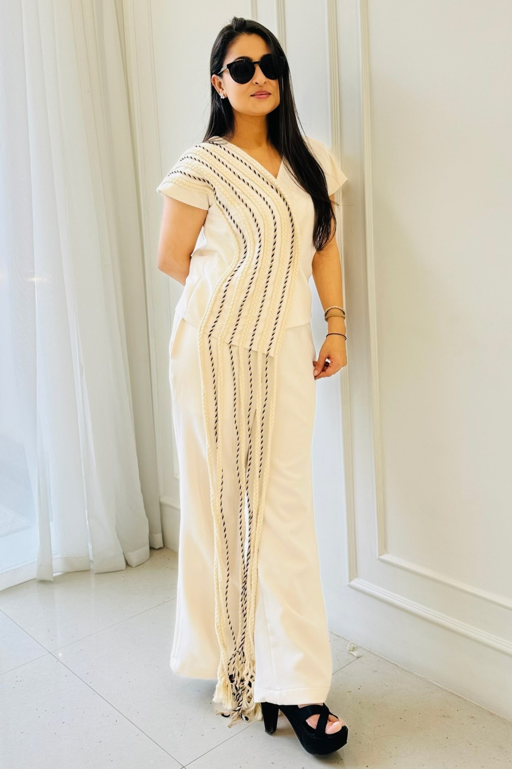The Braided White Co-ord Set featuring a statement overlapping top with handcrafted braided detailing